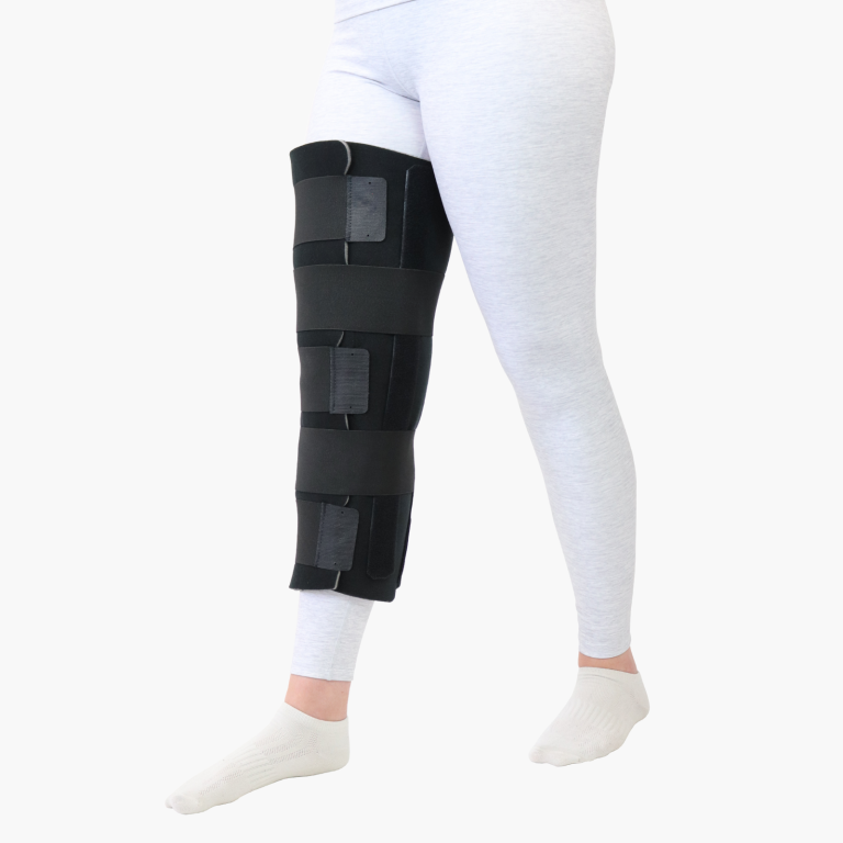 Bourne Knee Immobiliser brace providing rigid full-extension support and protection for post-operative knee recovery.